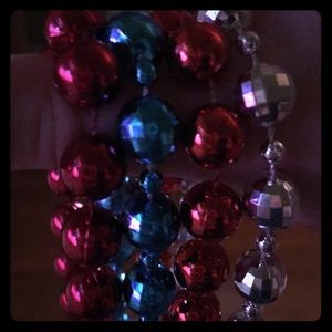 Very long shiny necklaces